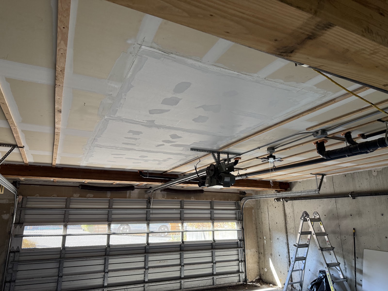 Repaired ceiling area blended into the surrounding ceiling