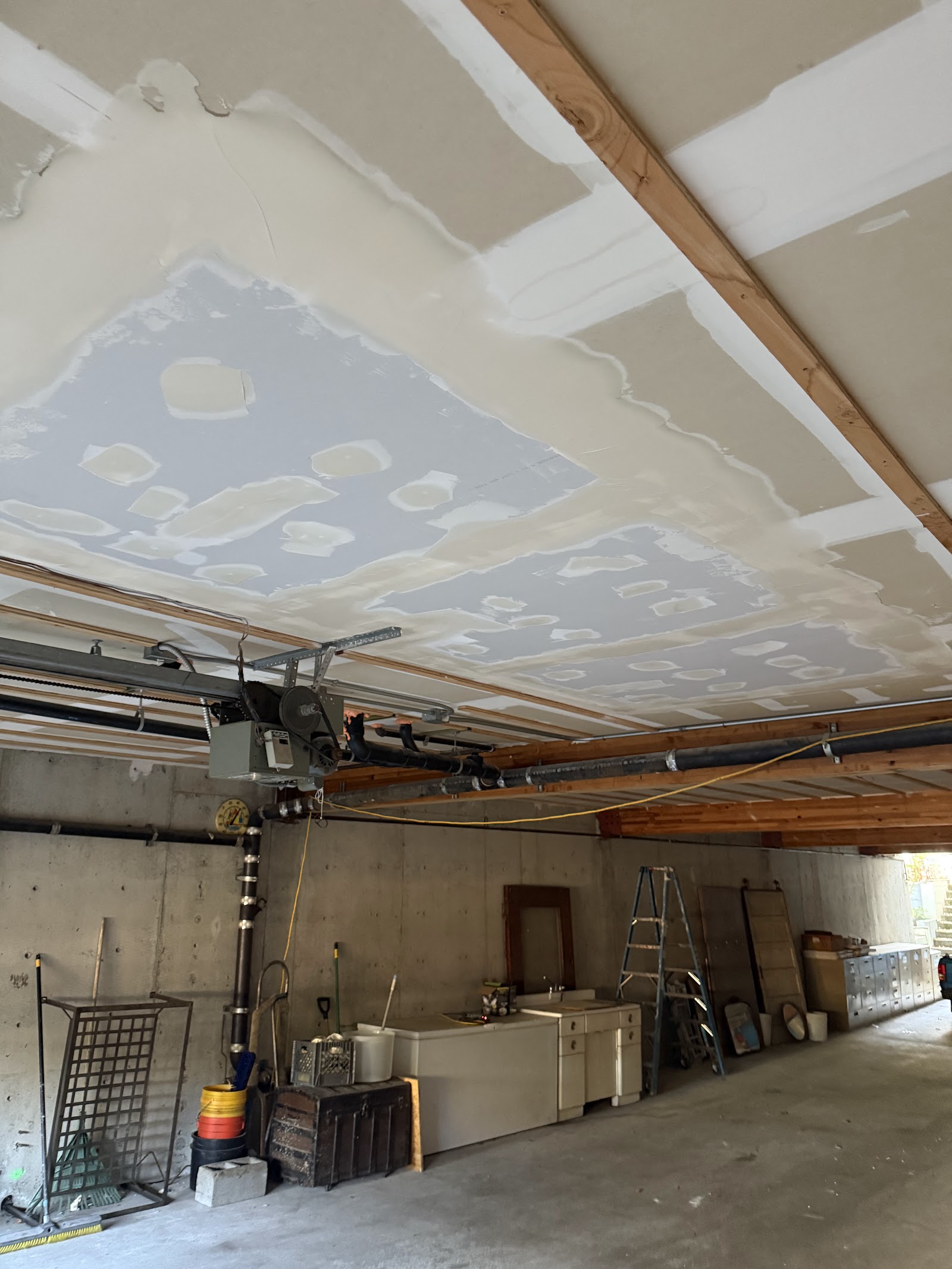 New drywall ceiling with first coats of joint compound